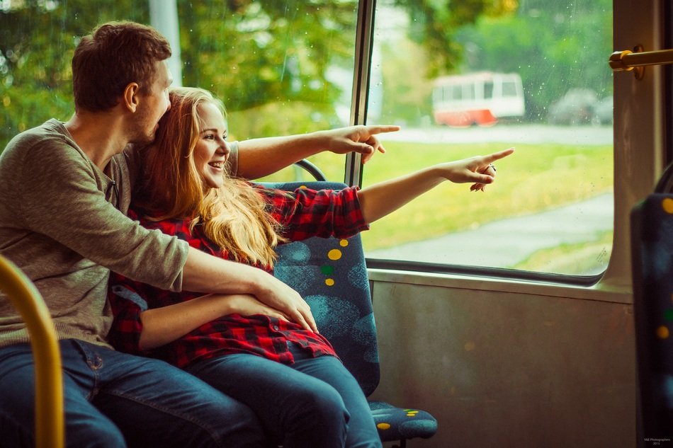 Happy Couple in Trolley Bus