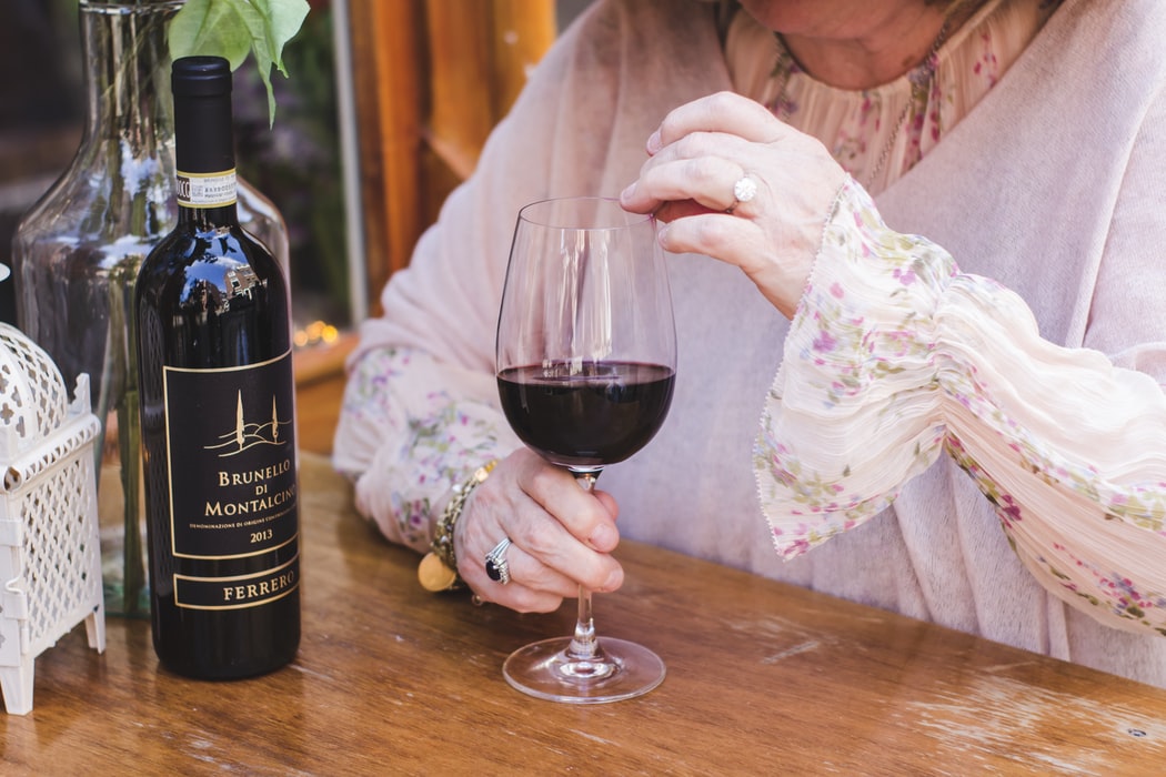 woman having wine at home