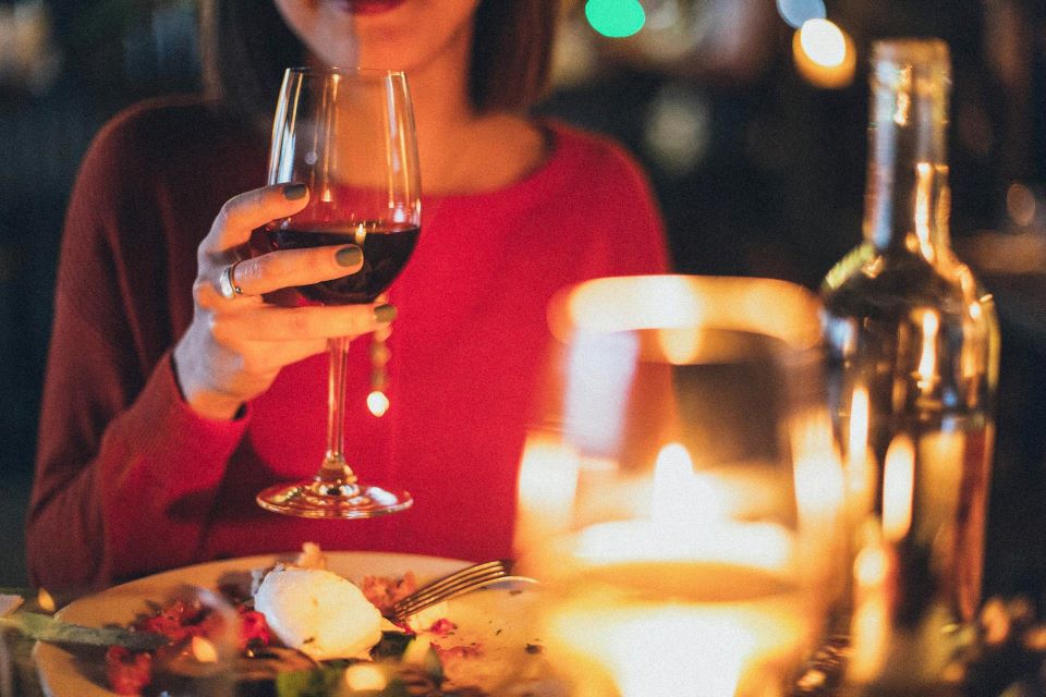 Woman holding wine glass